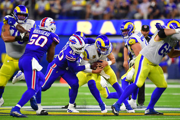 Sep 8, 2022; Inglewood, California, USA; Los Angeles Rams quarterback Matthew Stafford (9) is brought down by Buffalo Bills linebacker Von Miller (40) in the third quarter at SoFi Stadium. Mandatory Credit: Gary A. Vasquez-USA TODAY Sports